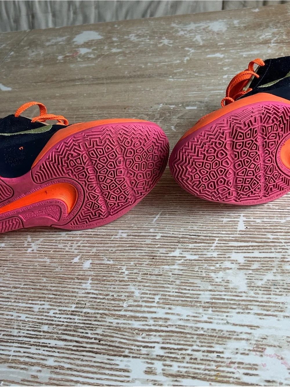 Nike Kids Low-Top Sneakers in Orange with Pink and Black Accents
